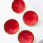 Noonday Mini Halo paprika earrings, two pairs