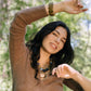 Noonday olive tagua bracelet on model