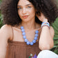 Noonday Misty glass necklace on model