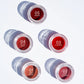 La Crique Lip & Cheek Balm shade range pots