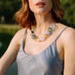 Noonday Iris glass necklace styled outdoors