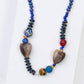 Noonday Ziwa necklace with carved horn heart beads