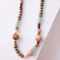 Noonday Kika beaded necklace in olive, burgundy and sage