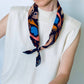 Mur by Ayca Peekaboo bandana tied at the neck