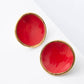 Noonday Mini Halo porcelain stud earrings in paprika red with gold rim