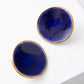 Noonday Halo porcelain stud earrings in deep indigo with gold rim