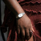 Jane Tethered Watch, Silver/Pearl – worn on the wrist
