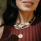 Noonday Ziwa necklace on model, close up