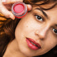 Model holding La Crique 03 The Red balm