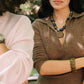 Noonday olive tagua bracelet styled on model